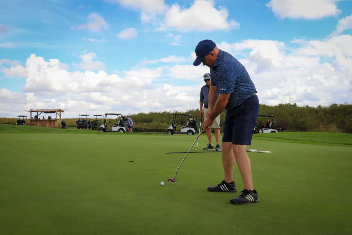 Bruce golfing